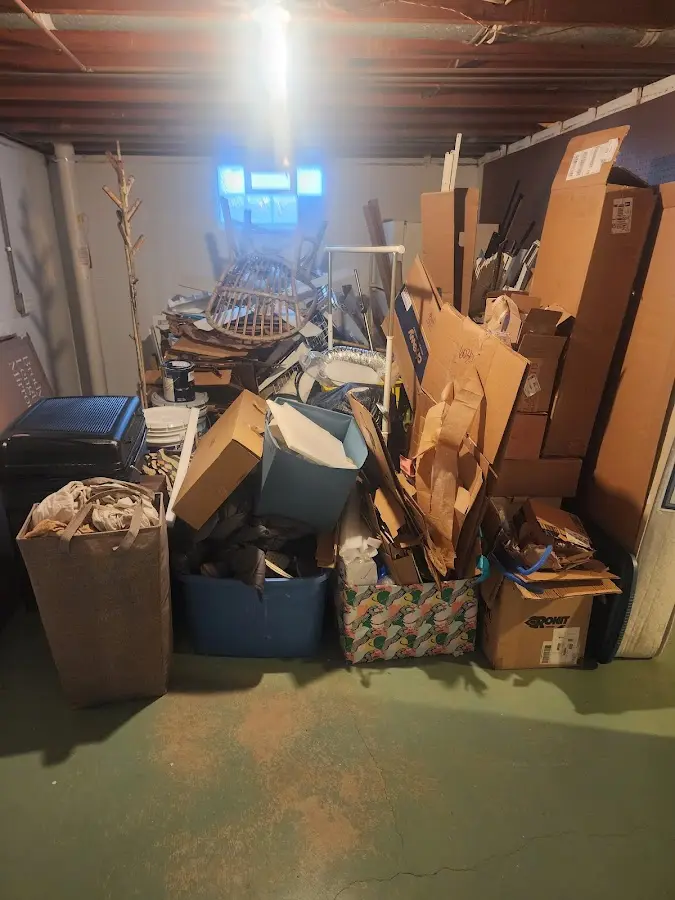 Roll-off dumpster container at job site for 4 Yard Dumpster Rental in Windsor